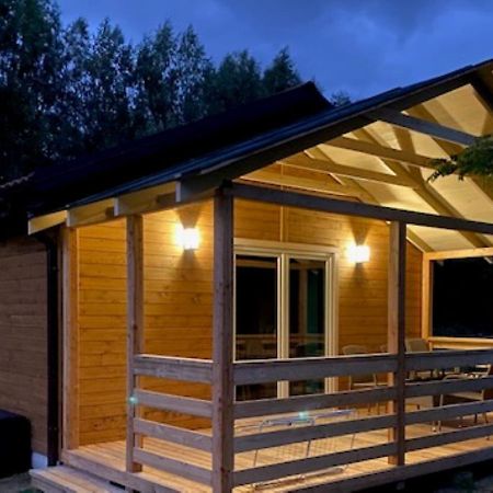 Miedzy Wodami - Domki Na Mazurach Mikołajki Exteriör bild